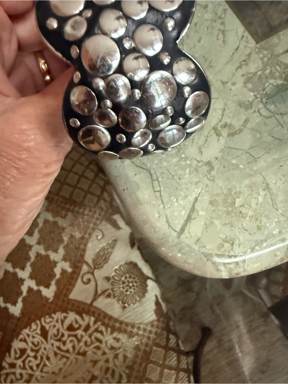 Cuff bracket silver tone black material